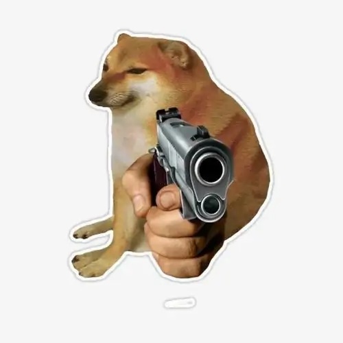 17 Chú chó Shiba ngồi nghiêng với khẩu súng chĩa sát ống kính, vẻ mặt thản nhiên làm pha dọa yêu thêm buồn cười