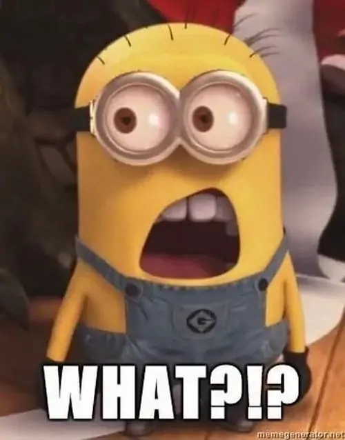 13 Nhân vật vàng đeo kính tròn mở miệng rất rộng, dòng chữ WHAT!? làm meme há hốc mồm hợp cảnh nghe tin sốc