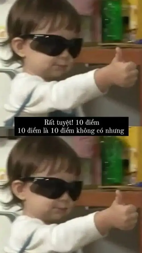 8 Meme mười điểm không có nhưng em bé đeo kính đen giơ ngón cái, áo sáng màu, dòng chữ nhỏ tạo kiểu khen tỉnh bơ