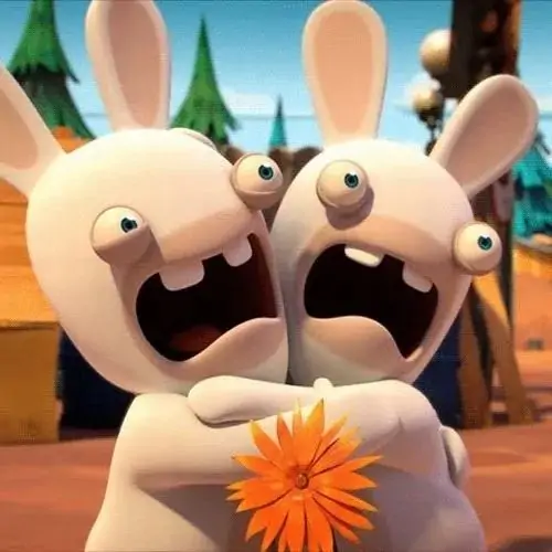 33 Hai chú thỏ hoạt hình màu trắng đứng sát nhau, miệng há to bên bông hoa cam như bị thiên nhiên troll nhẹ