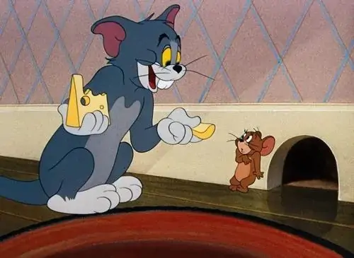 40 Hình troll vui nhộn đặt Tom trước màn hình máy tính với mặt đờ đẫn, bối cảnh bàn làm việc gợi cảnh vừa nhận thêm deadline